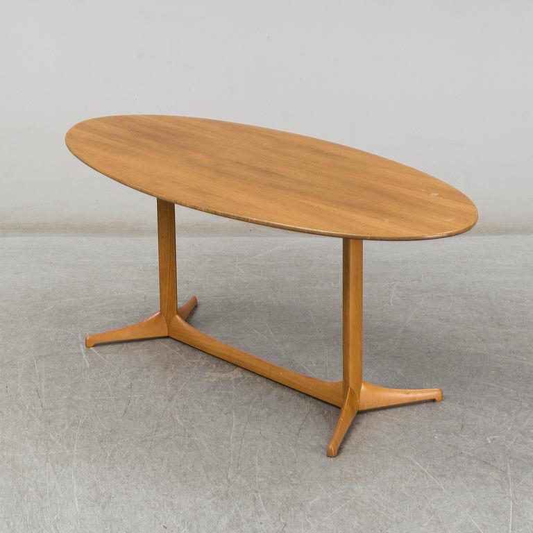 A 1959 'Plommonet' walnut coffee table by Kerstin Hörlin-Holmquist for Nordiska Kompaniet.