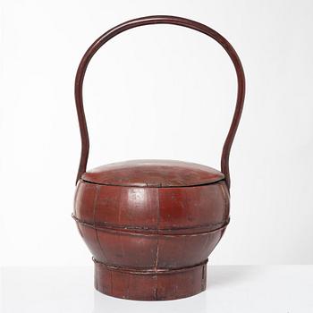 A group of three red wooden vessels, China/Southeast Asia, 20th century.