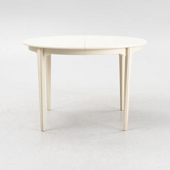 A Gustavian style table with four chairs, second half of the 20th century.
