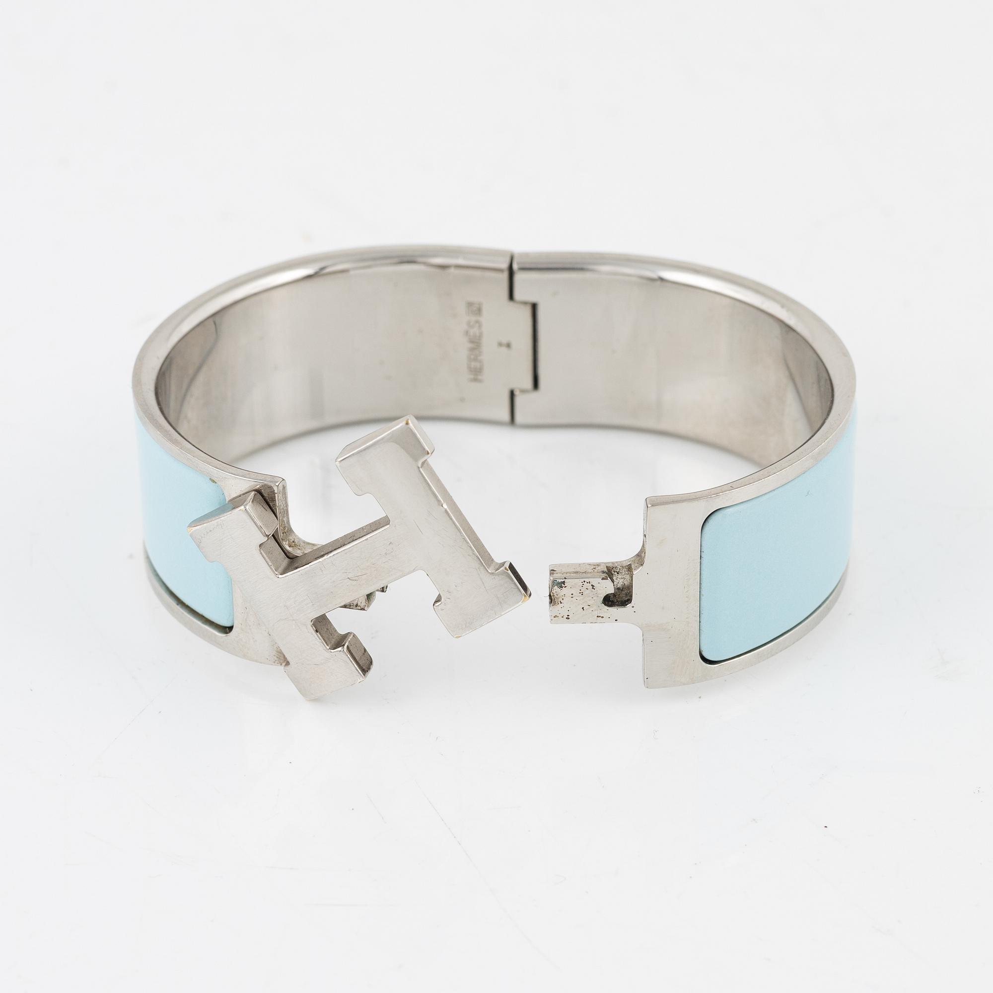 Hermès, a 'Clic Clac H' bracelet.