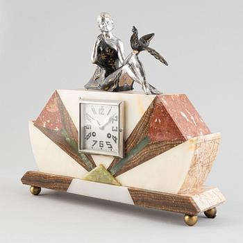 An Art Déco marble mantle clock and a pair of book ends, 1920's.