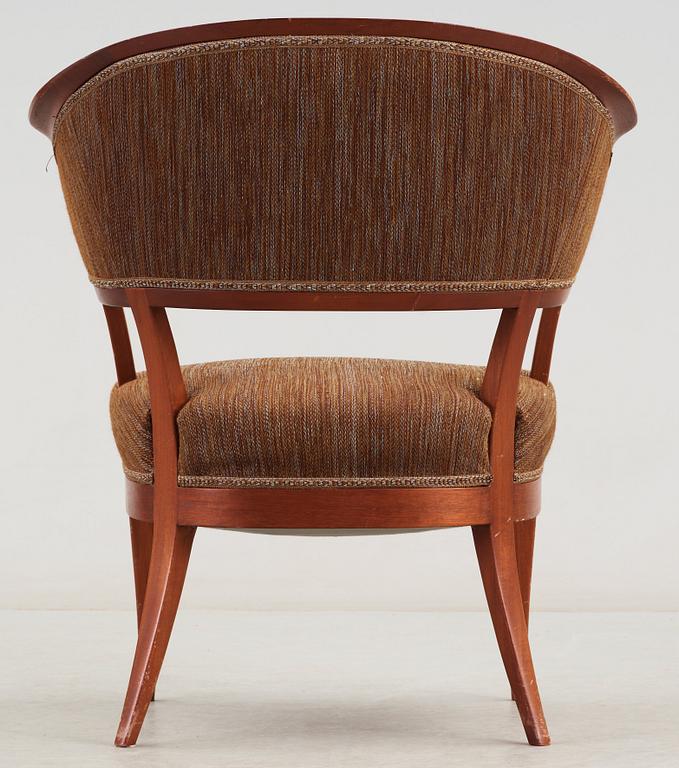 A Carl Malmsten mahogany easy chair 'Jonas Love', Sweden.