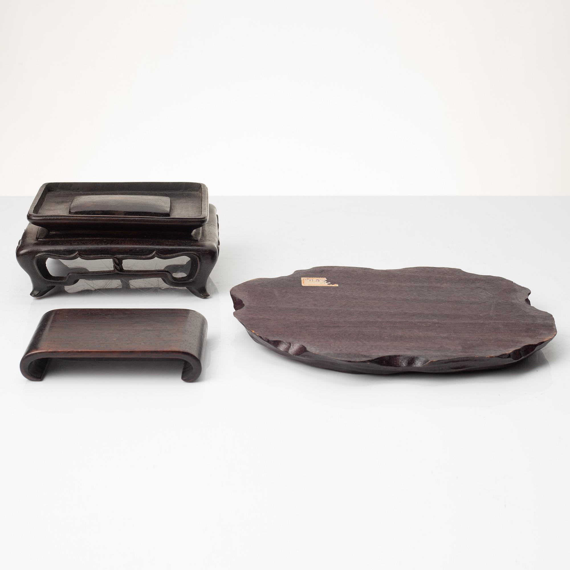 A group of Chinese hardwood stands and a cover, Qing dynasty and later.