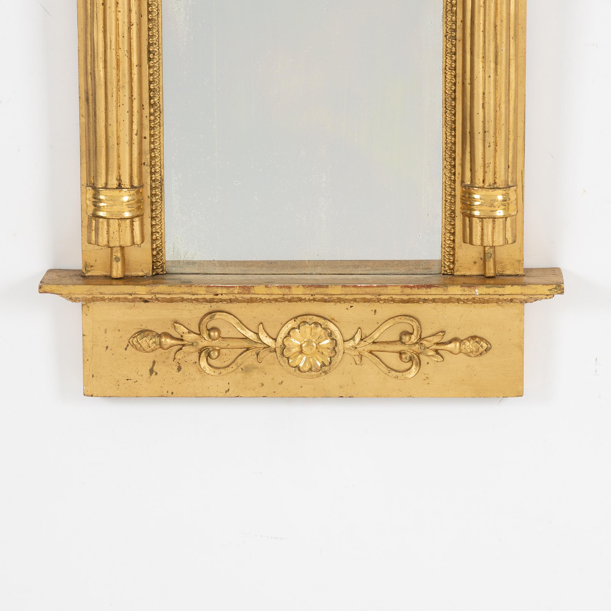 An Empire mirror, 1820.