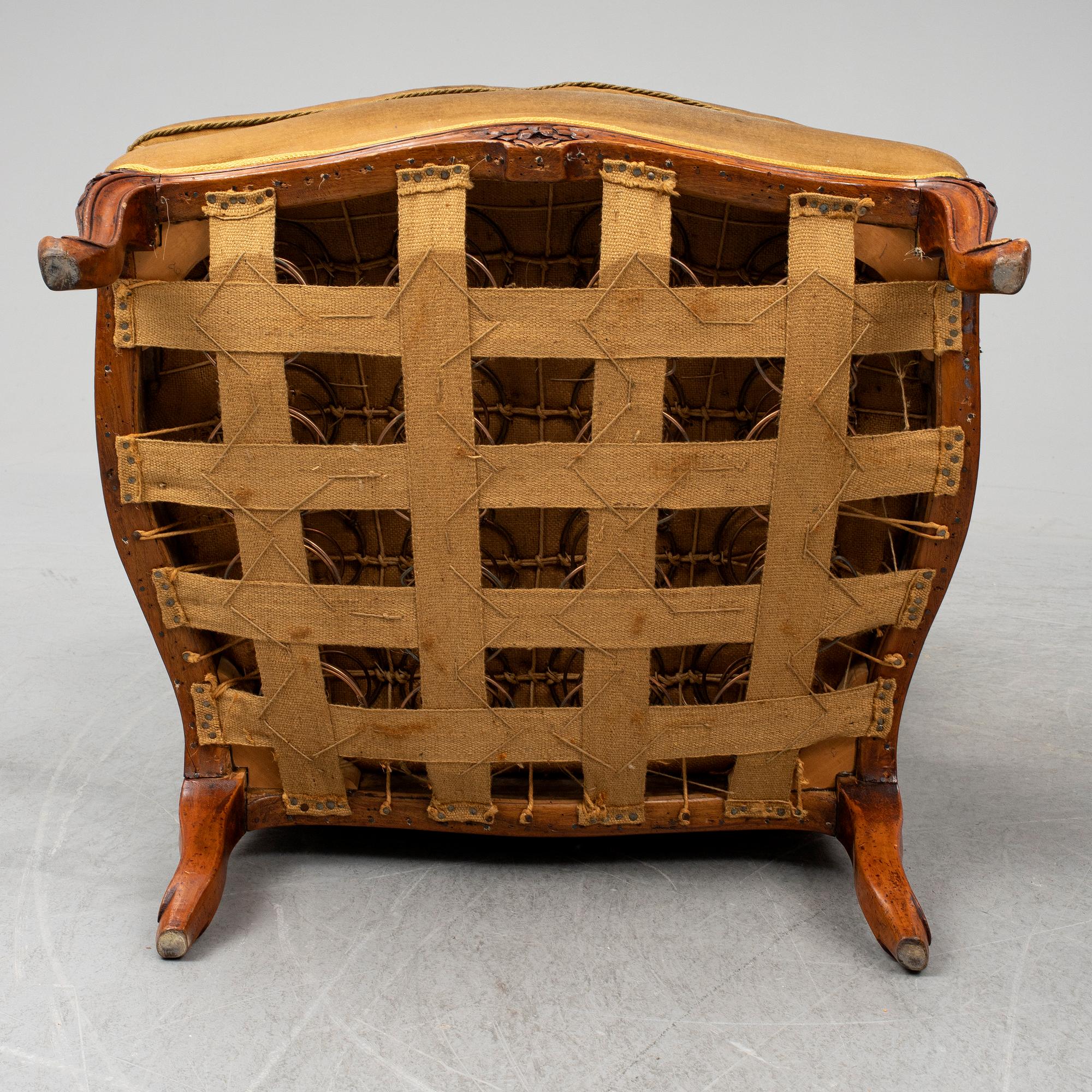 A mid 18th Century Louis XV  bergere chair, marked 'Philippe'.