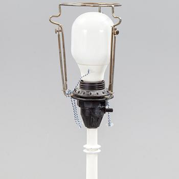 a 20h Century floor lamp designed by Hans Agne Jakobsson.