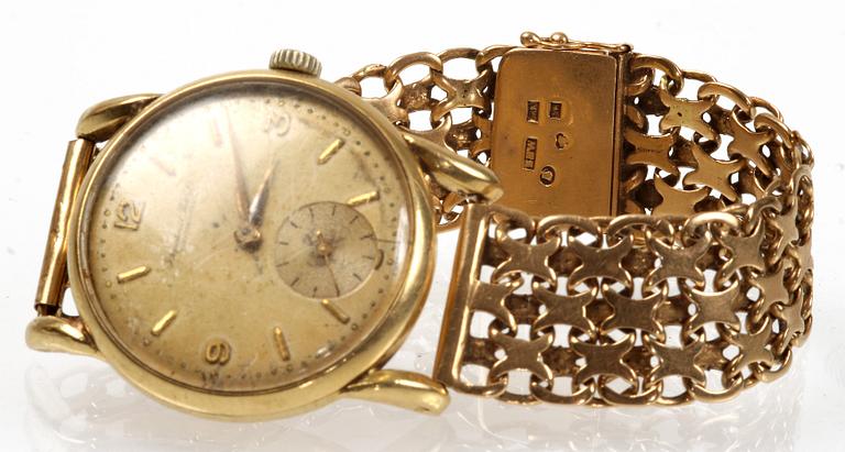 ARMBANDSUR, 18 K guld, EHW, Stockholm, 1947. Tot vikt 68 gr.