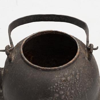 Two teapots and a hibachi brazier, Japan, early/ first half of the 20th century.