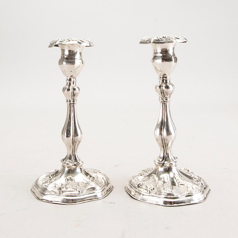 A 19th century pair of silver candle sticks mark of Oskar Närman Mariestad 1877.