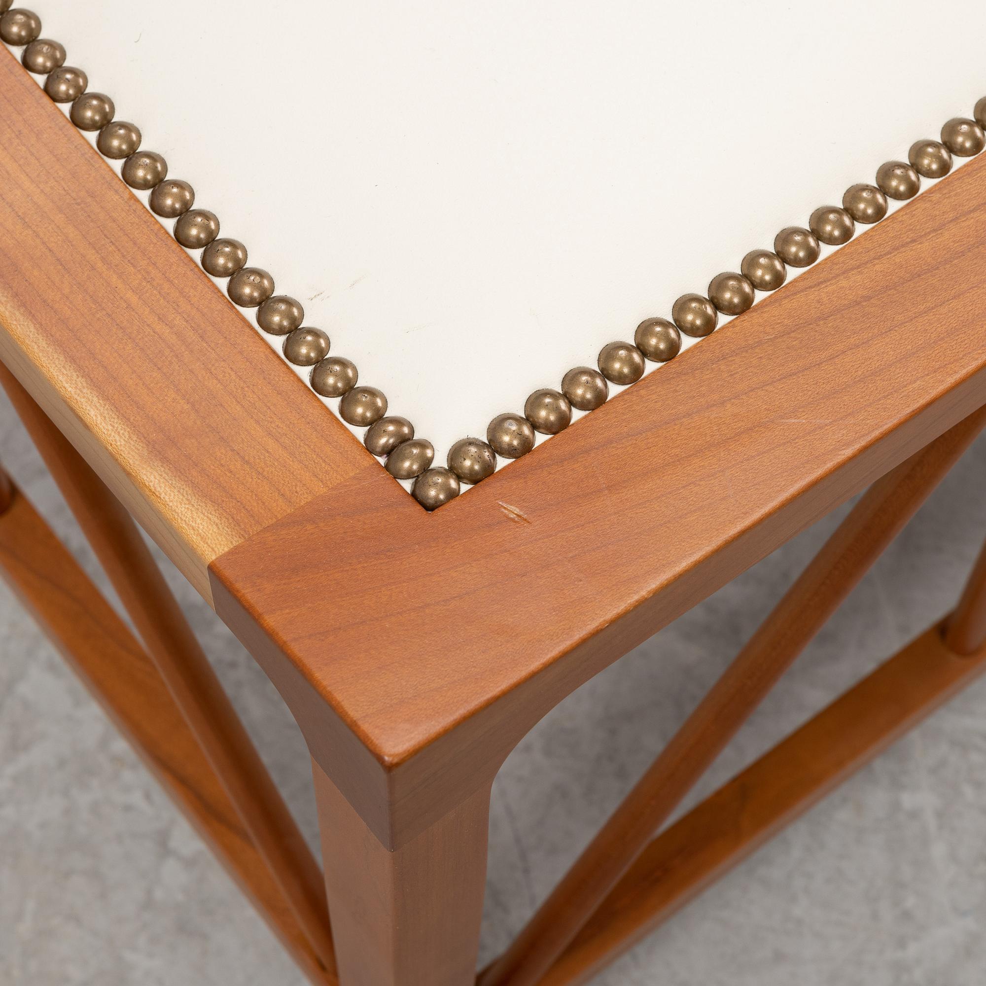 Josef Frank, a model 1063 cherry wood stool, Firma Svenskt Tenn, 21st Century.