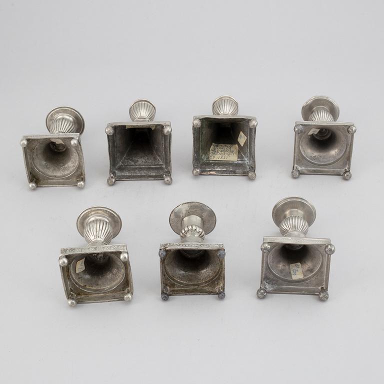 7 pewter candlesticks, 19th Century. (2+2+2+1).