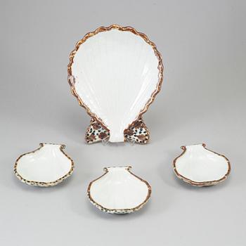 GUNNAR NYLUND, four stoneware oyster dishes, Rörstrand.