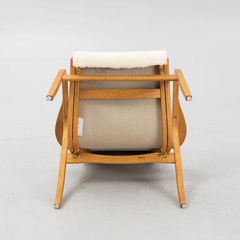 Yngve Ekström, a 'Lamino' armchair, Swedese.