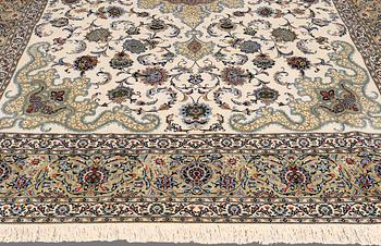 A signed so called Royal Kashan carpet, ca 432 x 313 cm.