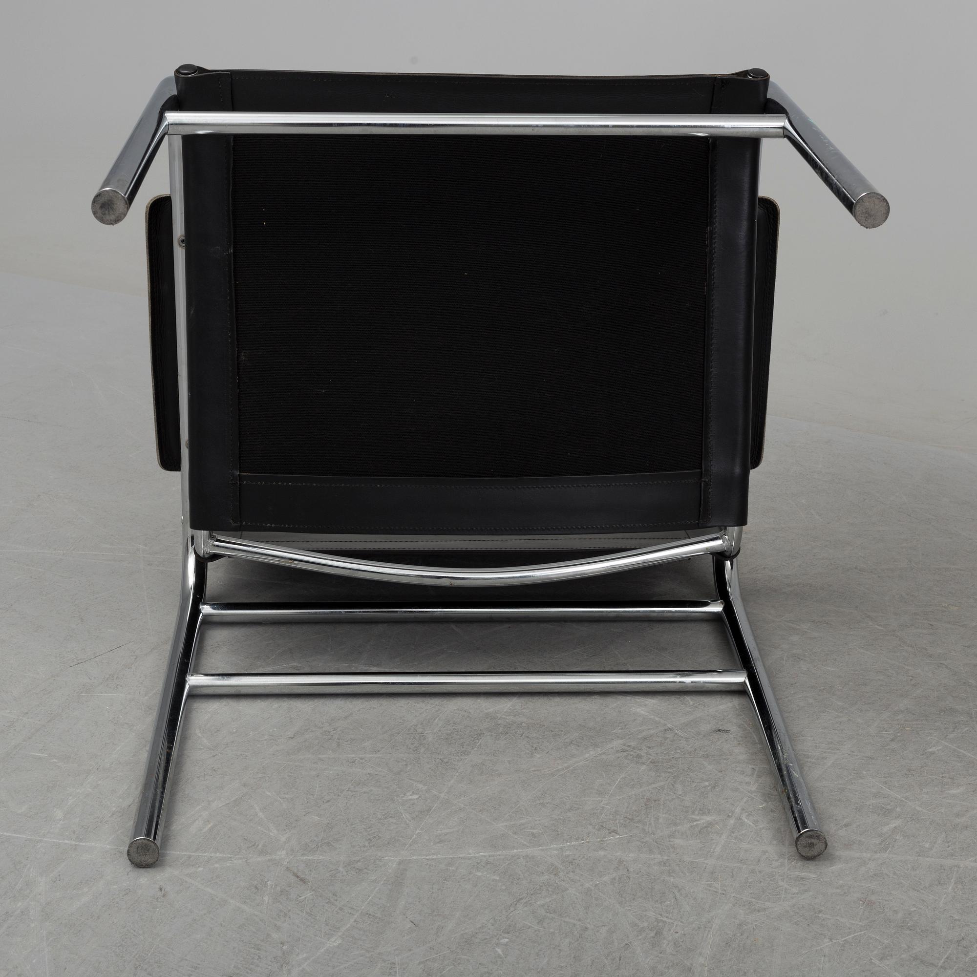 TORD BJÖRKLUND, a pair of 'Klinte' tubular steel easy chairs from IKEA.