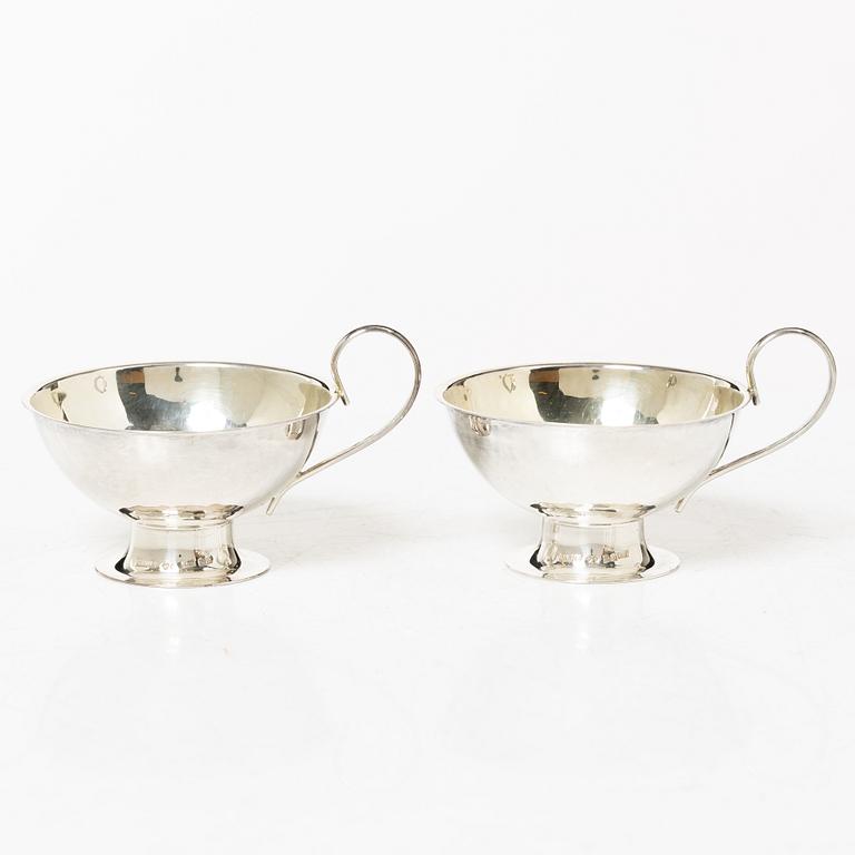 A set of twelve Swedish silver punsch cups, including Ceson, Gothenburg 1989.