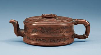 1561. A Yixing tea pot with cover, Qing dynasty.