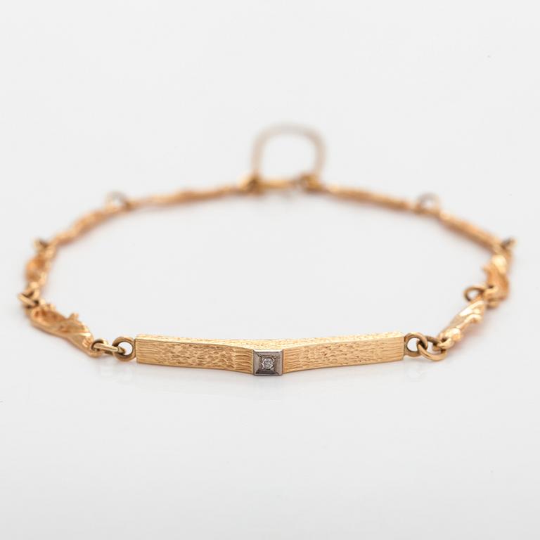 A 14K gold and diamond bracelet. Finnish hallmarks 1980.