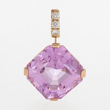 A 14K gold pendant, with diamonds and a kunzite approximately 37.80 ct according to certificate.
