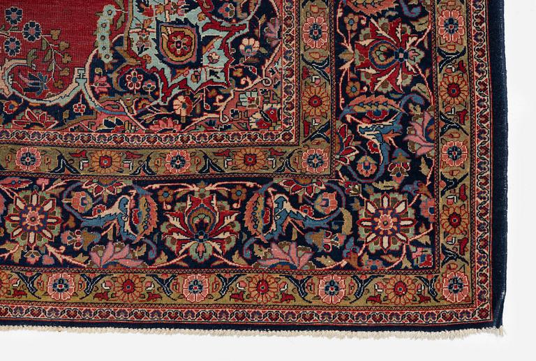 A semi-antique Kashan carpet, Central Persia, c. 320 x 237 cm.