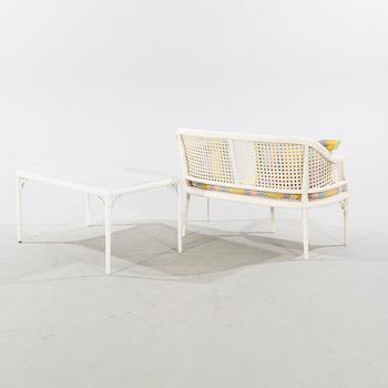 A late 20th century Miranda sofa and table.