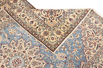 A Nain, part silk carpet, c. 196 x 120 cm.