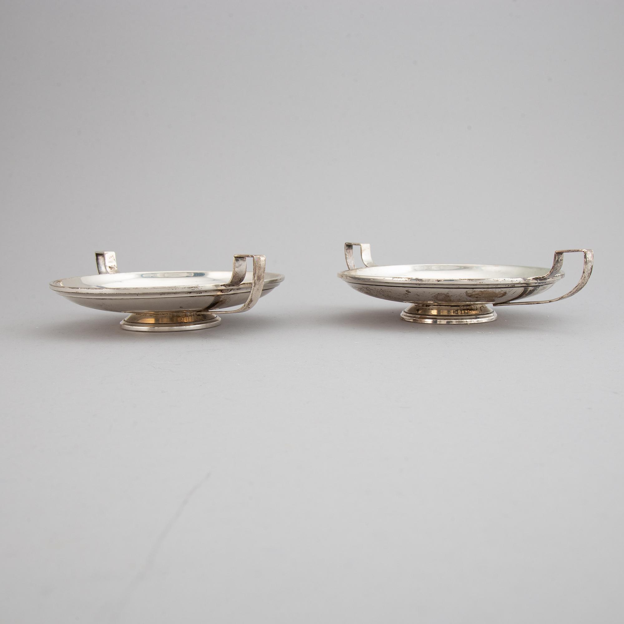 A pair of sterling silver tazzaz.