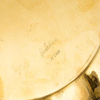 A set of four brass plates by Ture Henrikson, Arvika.