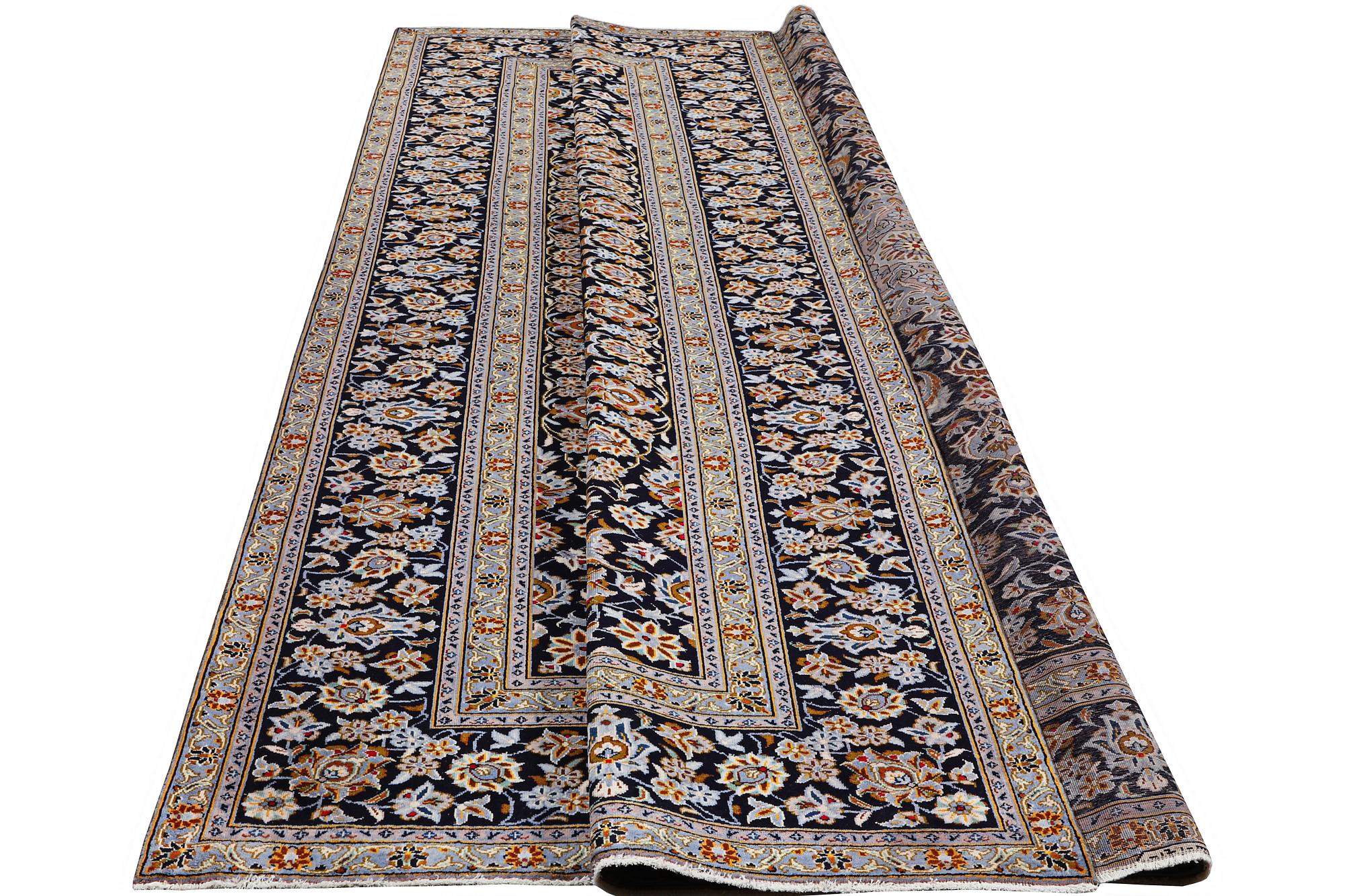 A Kashan carpet, c. 405 x 303 cm.