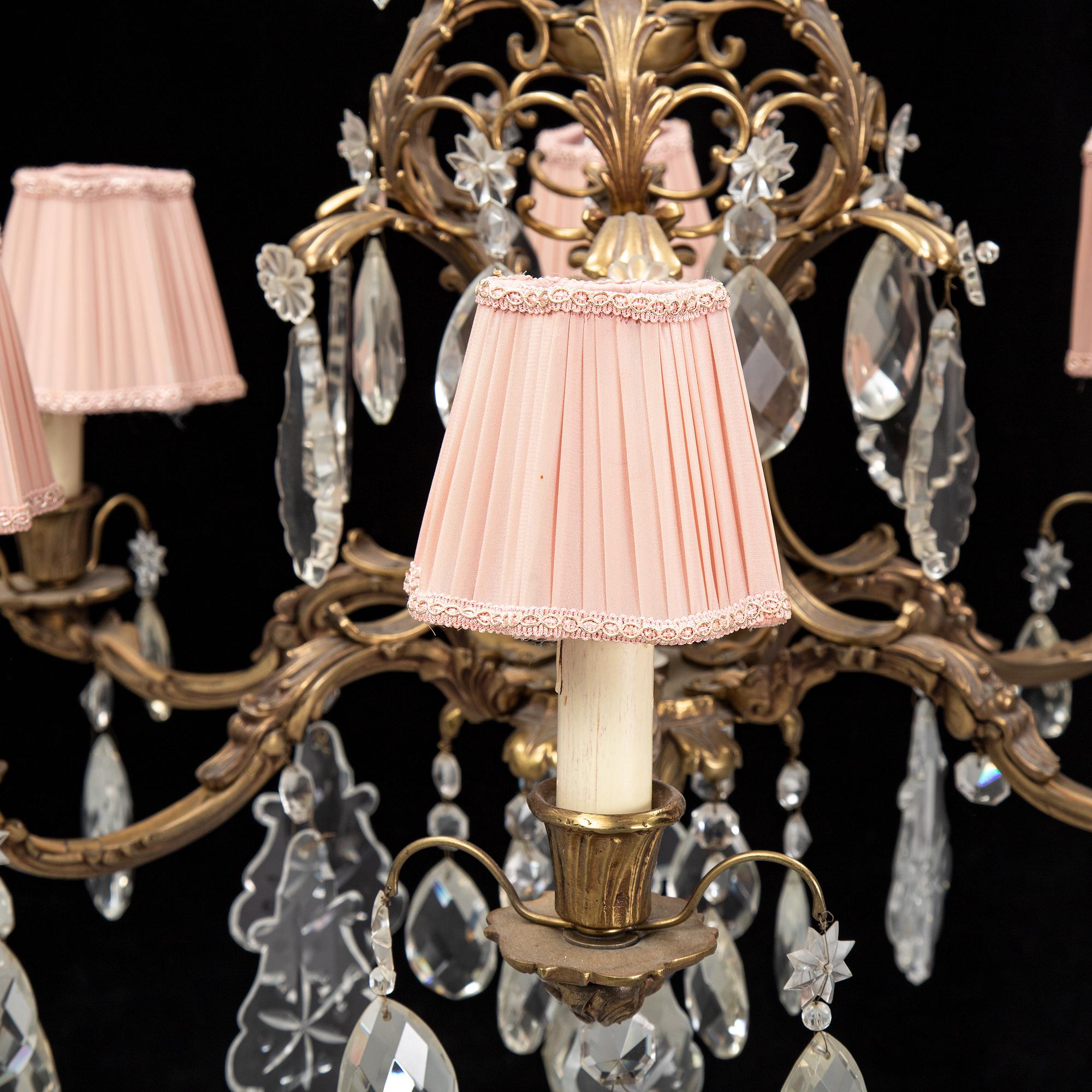 A brass and glass chandelier.