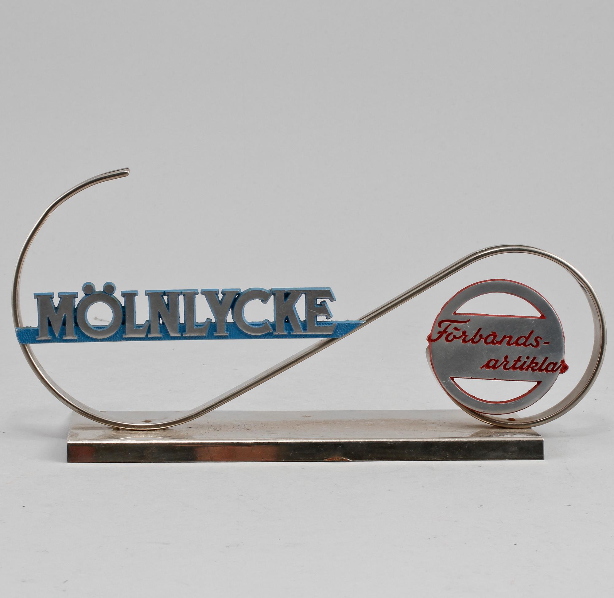 REKLAMSKYLT, metall, omkring 1900-talets mitt.