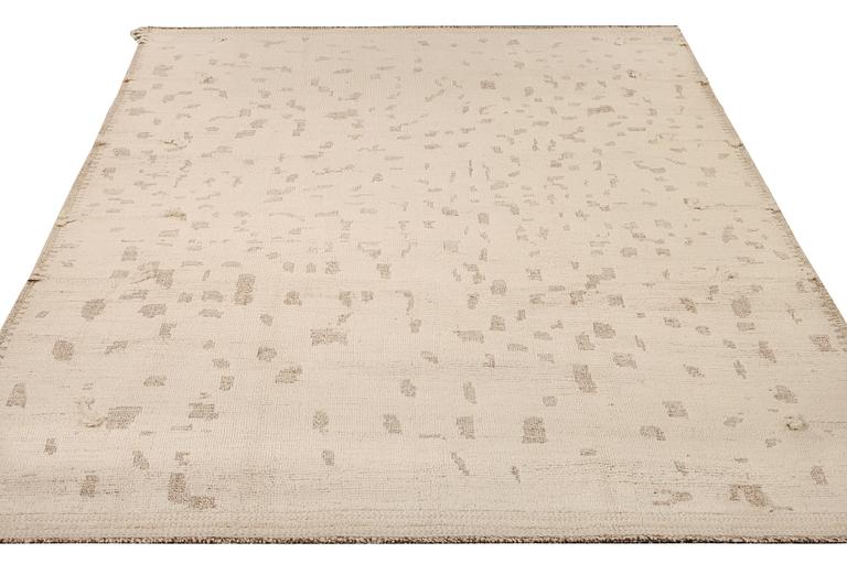 A Moroccan carpet, a. 292 x 246 cm.