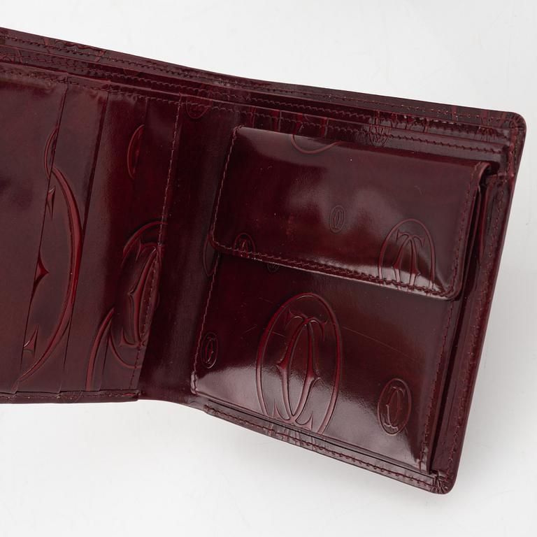 Cartier, plånböcker 3 st samt nyckelring.