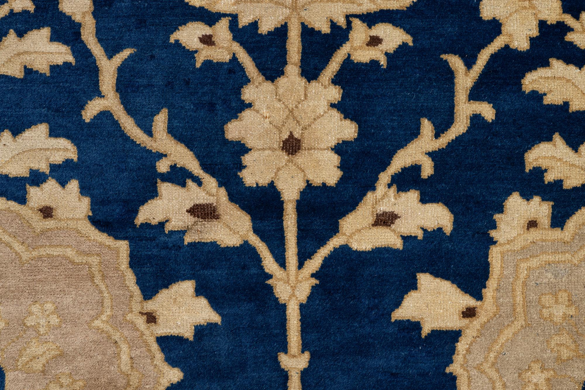 An antique Peking carpet, north China, c. 438 x 373 cm.