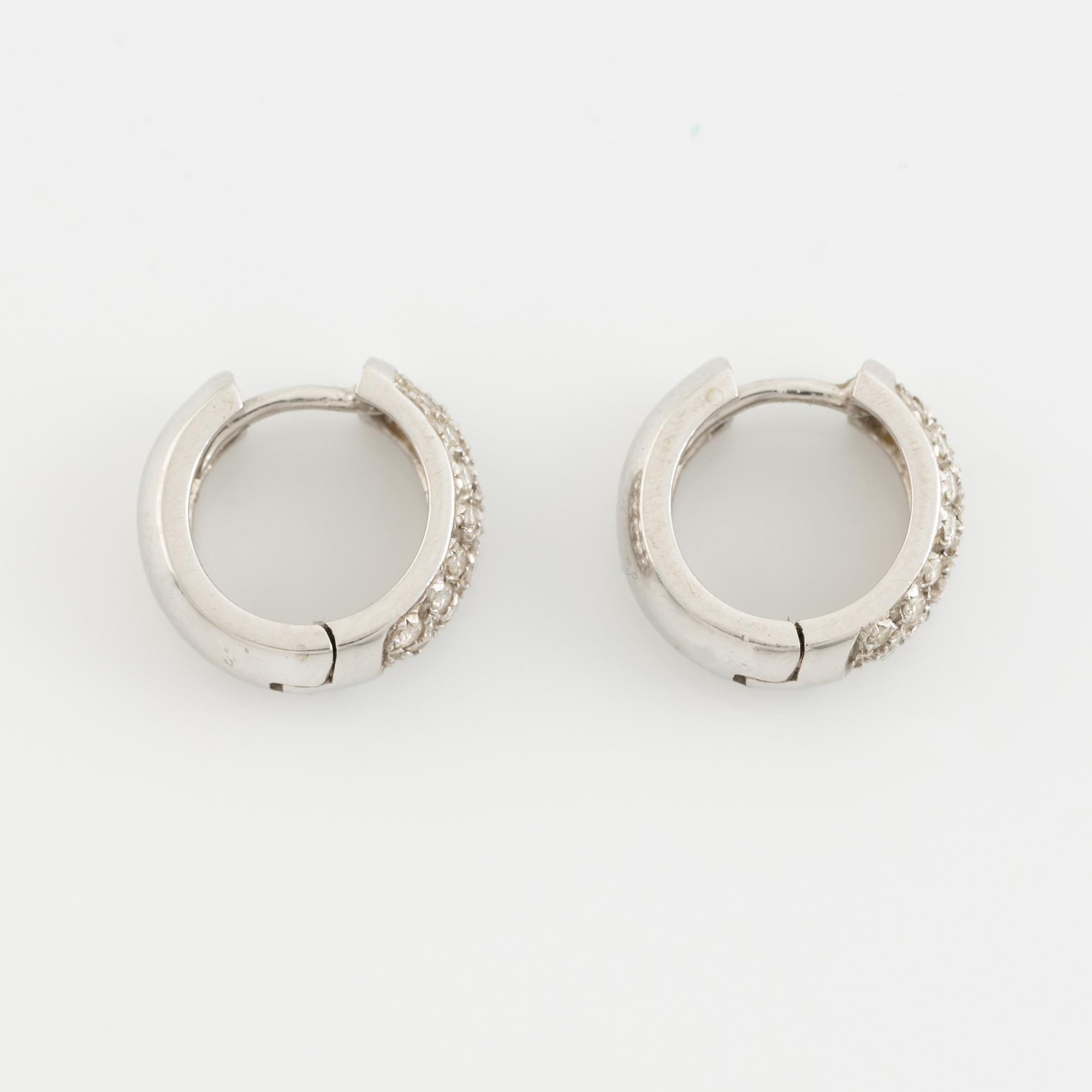 A pair of 18K white gold earrings with diamonds ca. 0.60 ct in total. Finnish import marks 1998.