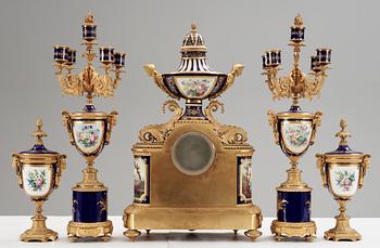 A French 'Sèvres' five piece gilt-bronze garniture, 19th Century, Signed P.D. Boucher.