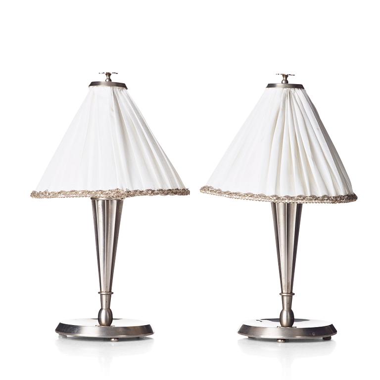 HARALD ELOF NOTINI, a pair of pewter table lamps by Böhlmarks, Stockholm 1920's-30's.