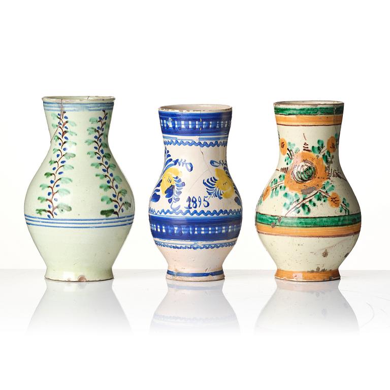 A group of seven European faiance and earthenware pitchers, partly France and Italy 19th century.