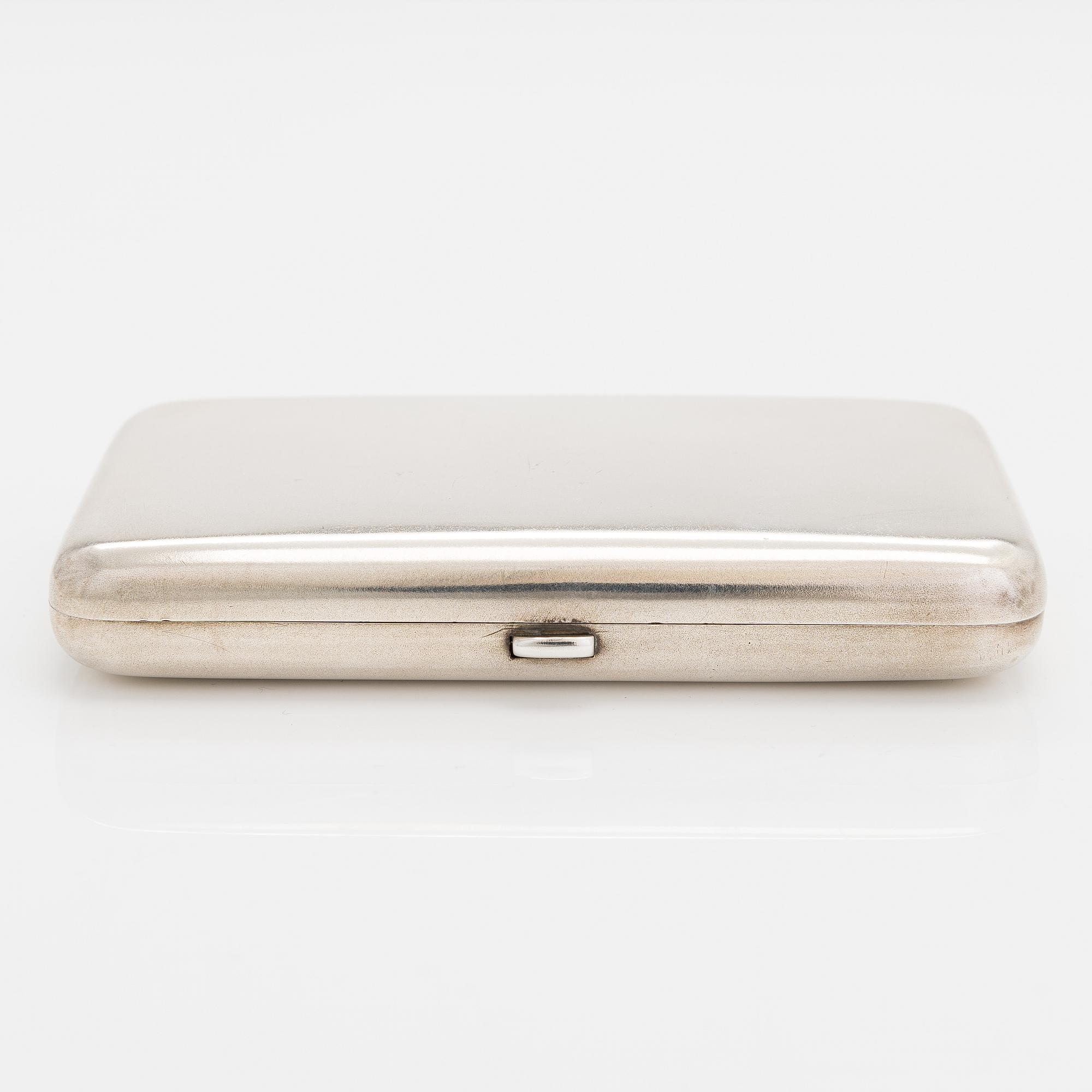 A silver cigarette case, Hlebnikov,  Imperial warrant, unidentified maker's mark, Moscow 1899-1908.