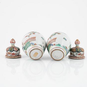 A pair of Japanese jars with covers, circa 1900.