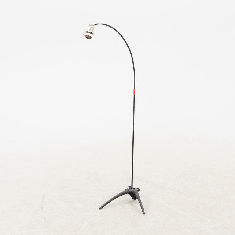 A metal floor lamp from the later part of the 20th century.