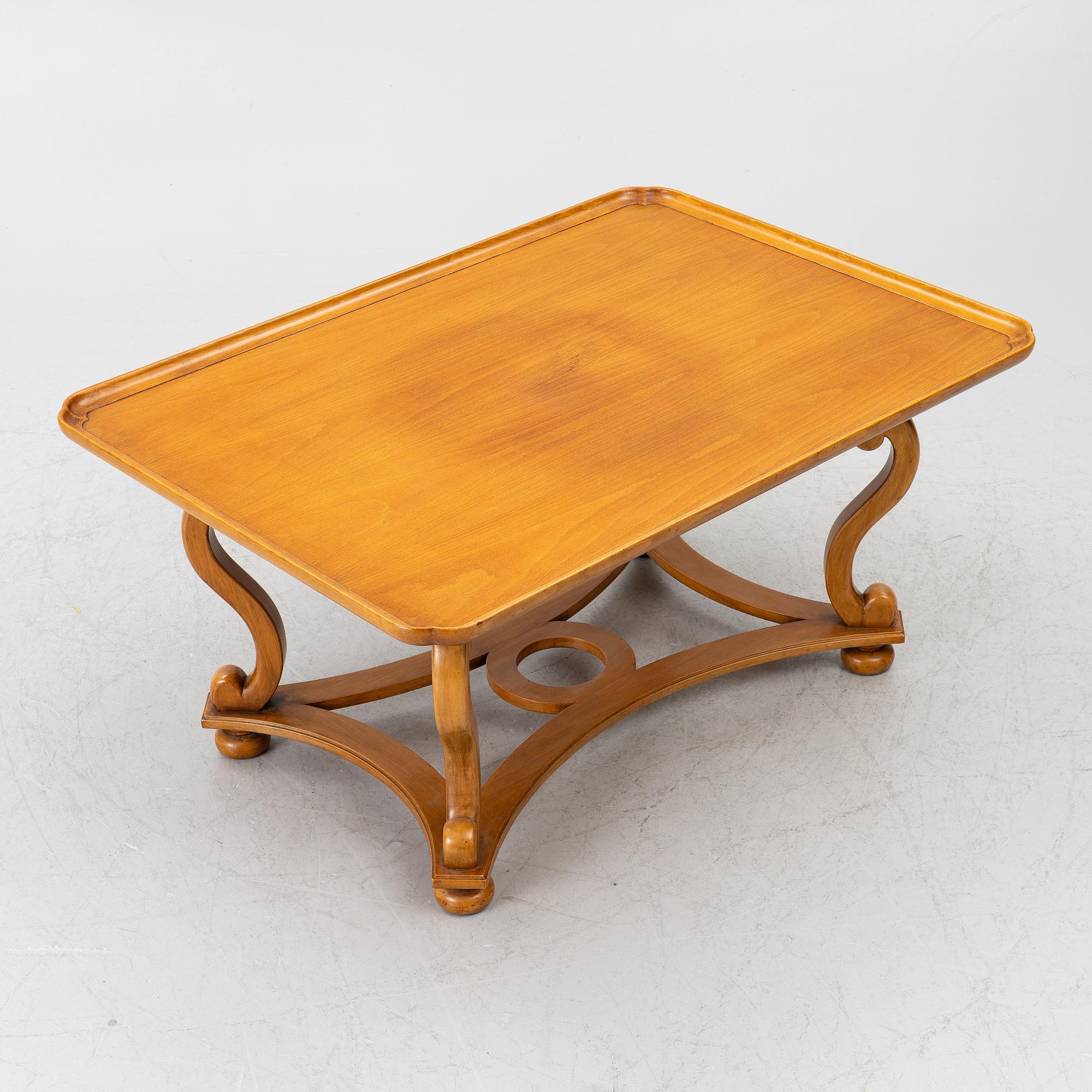 Coffee table, 20th century, with linked legs.
