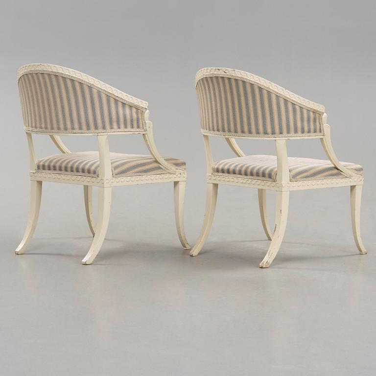 A pair of late Gustavian armchairs in the manner of Ephraim Ståhl, master in Stockholm 1794-1820.