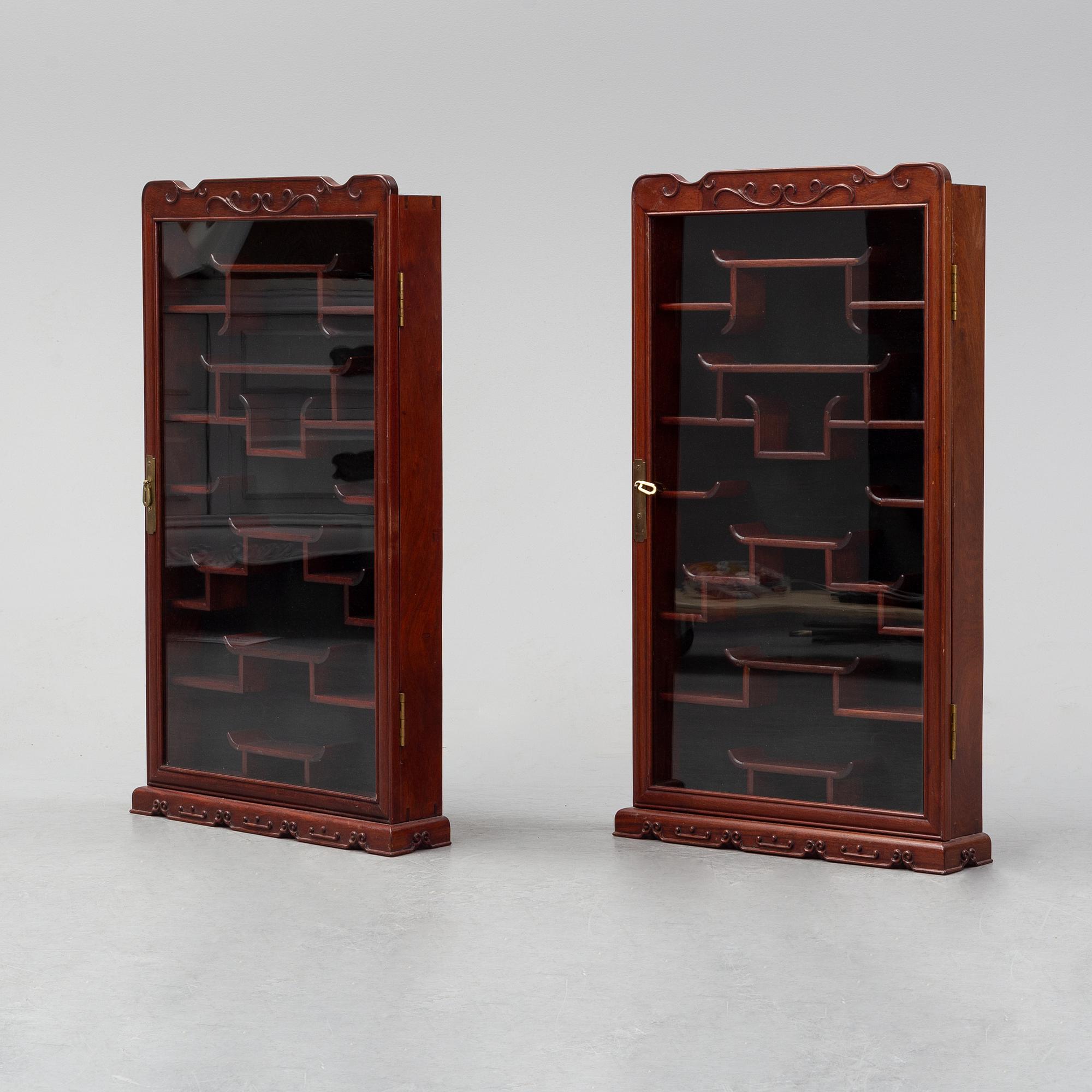 A pair of chinese wall cabinets, 20th century.