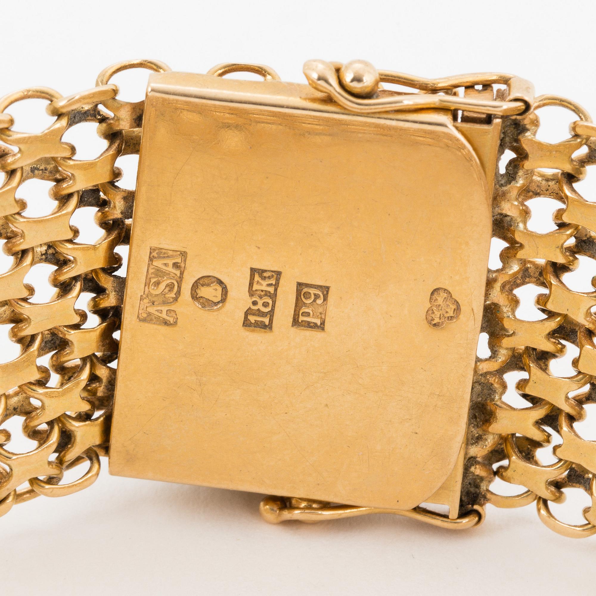 18K gold bracelet.