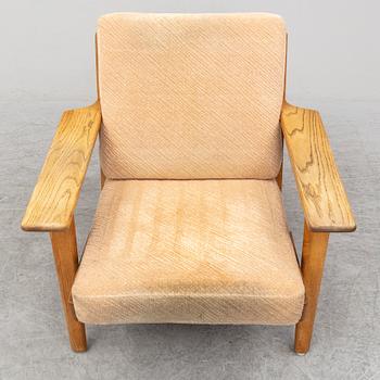 HANS J WEGNER, an oak 'GE-290' easy chair from Getama, Denmark.