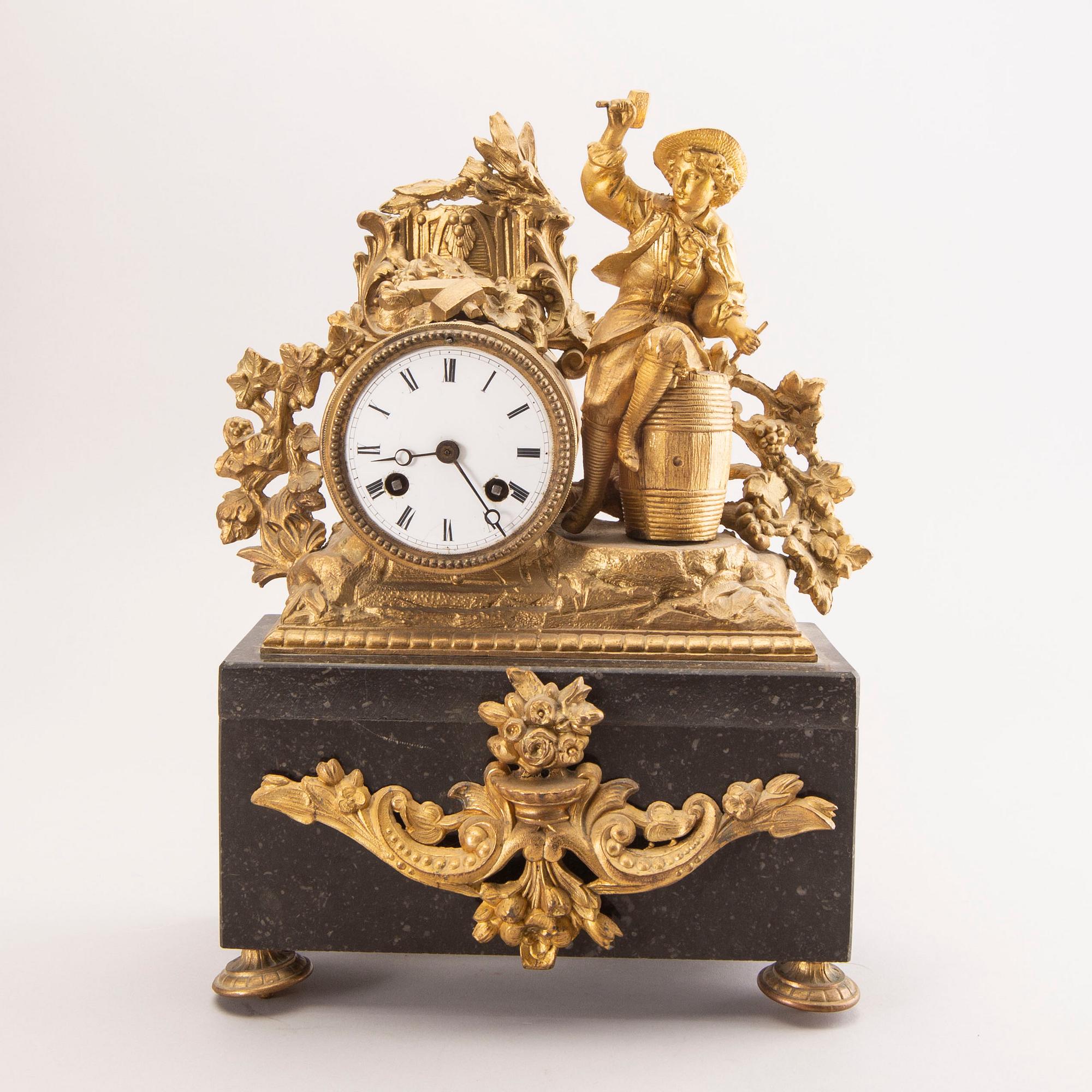 A Neo Rococo bronzed table clock.
