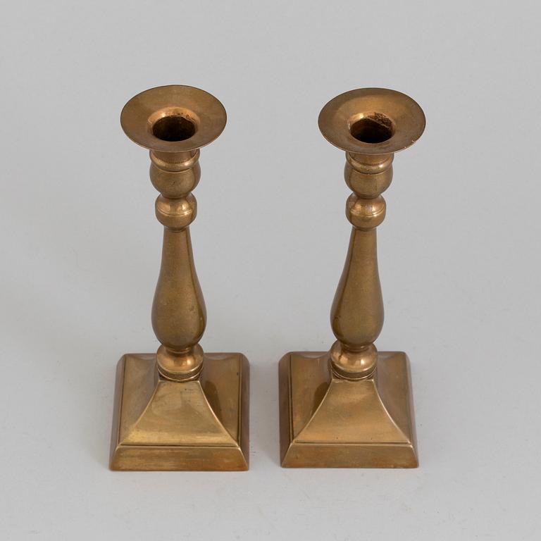 A PAIR OF BRONZE CANDLESTICKS, 19th century.