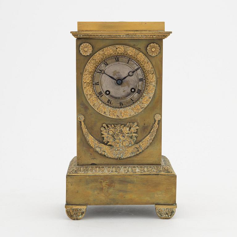 An Empire mantle clock, mid 19th century.