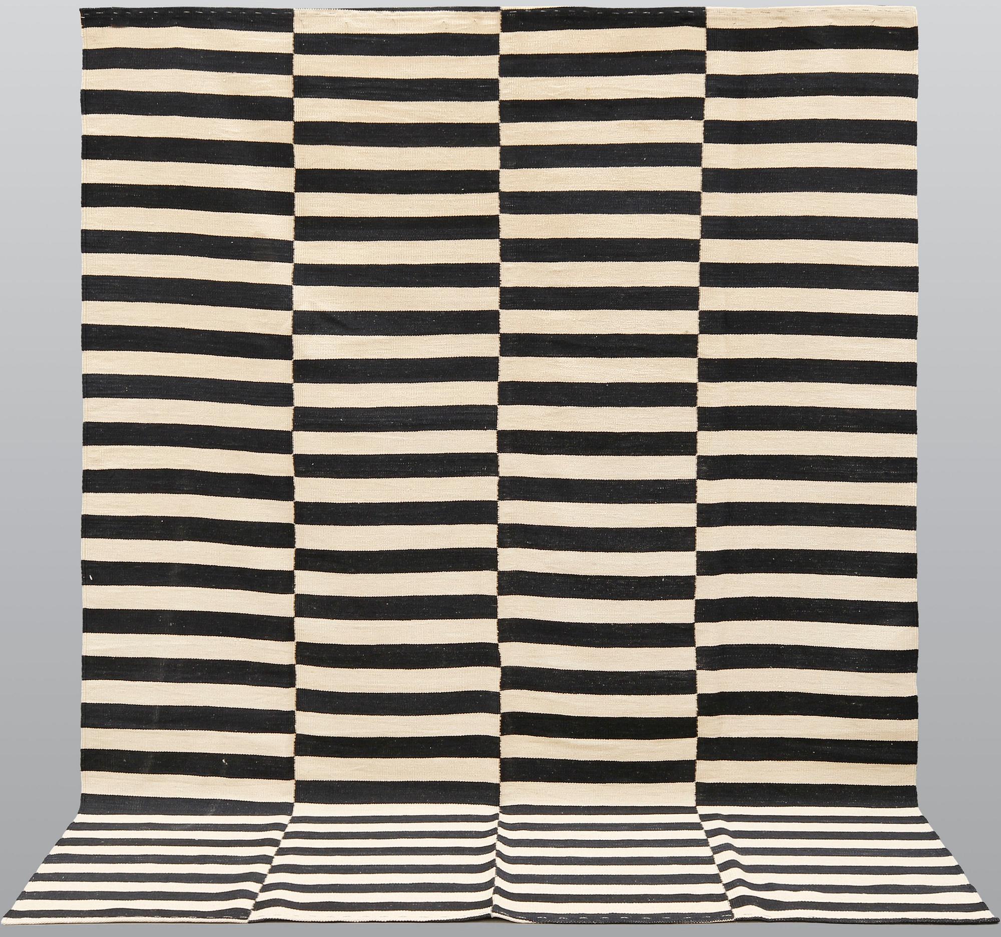 A carpet, flat weave, ca 288 x 210 cm.
